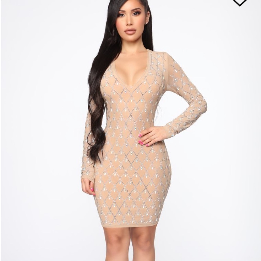 Dramatic effect rhinestone nude mini dress